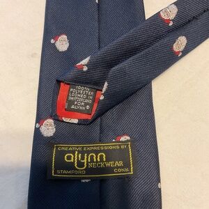 Alynn Neckwear. Christmas Embroidered Santa Holiday Tie. Navy Blue